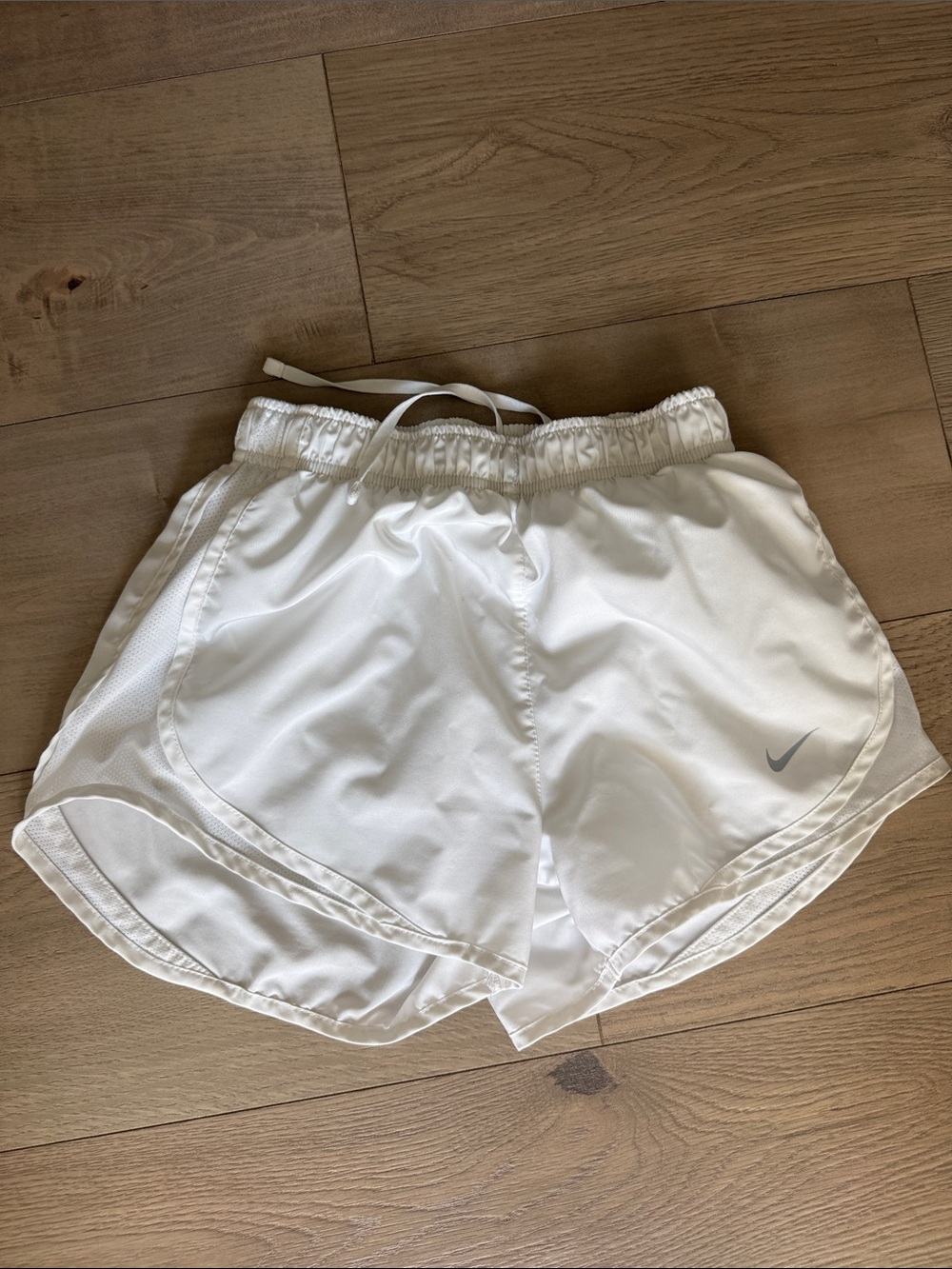 Nike Women's White Athletic Running Shorts with Silver Swoosh